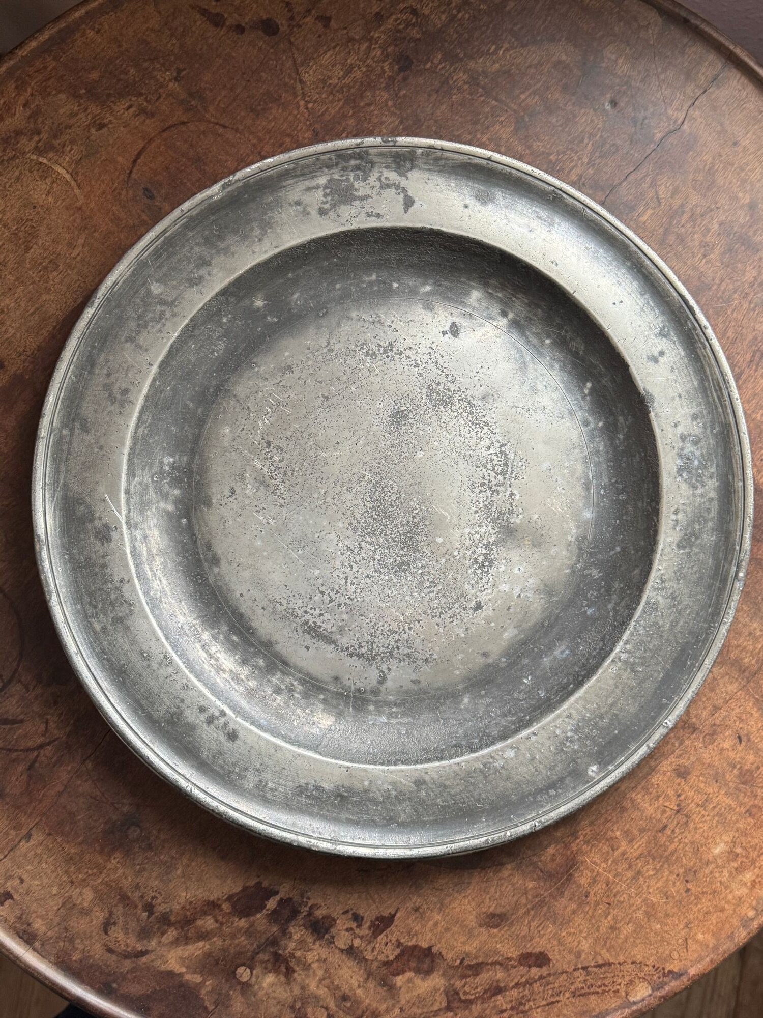 A pair of 18thC English pewter chargers image 9